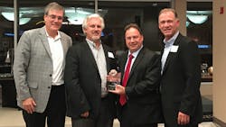 Left to right Ricardo Schneider president Danfoss Turbocor Compressors Greg Tutwiler chief technology officer Smardt Chiller Group Vince Canino global chief operating officer Smardt Chiller Group and John Galyen president Danfoss North America Left to right Ricardo Schneider president Danfoss Turbocor Compressors Greg Tutwiler chief technology officer Smardt Chiller Group Vince Canino global chief operating officer Smardt Chiller Group and John Galyen president Danfoss North America