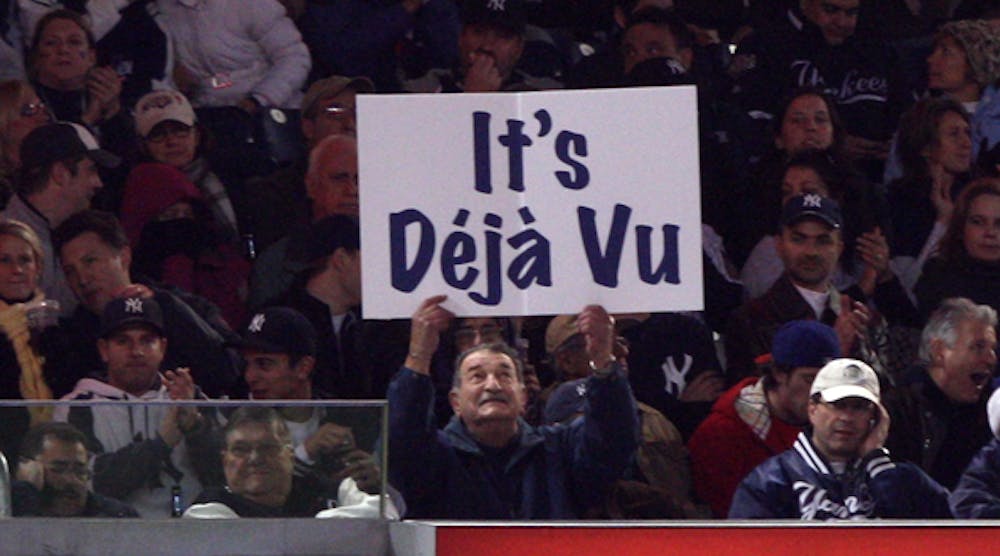 A fan of the New York Yankees holds up a sign reading, &ldquo;It&apos;s D&eacute;j&agrave; Vu,&rdquo; in reference to Hall of Famer Yogi Berra during Game 2 of the 2009 MLB World Series at Yankee Stadium in the Bronx borough of New York City Oct. 29, 2009. The Series pitted the Yankees against the Philadelphia Phillies. (Photo by Jed Jacobsohn/Getty Images)