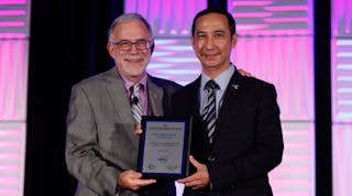 ASHRAE 2016-17 President Timothy G. Wentz, PE, FASHRAE, HBDP, (left) presents the Chapter Program Star Award to Chun-Sing Wong, PhD, BEAP.