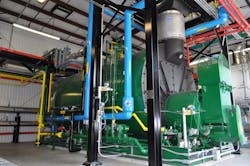 One of the three new gas-fired, 900-BHP fire-tube boilers installed at Alliance One. One of the three new gas-fired, 900-BHP fire-tube boilers installed at Alliance One.