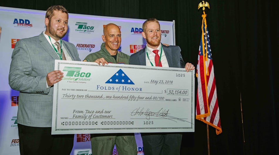 Taco&rsquo;s John White III and Ben White present Major Dan Rooney with a check from Taco Comfort Solutions at the 2018 Eastern Energy Expo in Mashantucket, CT.