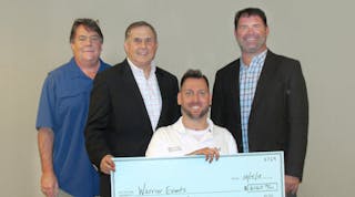 Ron Saunders (right), vice president of HVAC indoor air quality manufacturer Fresh-Aire UV, presented a check to injured veteran Adam Keys (second from right), a former U.S. Army paratrooper who lost three limbs in Afghanistan in 2010, via Robert Saunders, president of veterans charity Warrior Events; and Bill Williams (left), executive vice president at HVAC contractor B&amp;B Air Conditioning &amp; Heating Service Co., Rockville, Md.