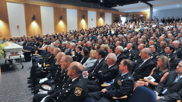 More than 600 people attended the funeral service for Westfield Mass police officer Jose Torres in the Westfield State University auditorium
