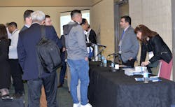 AHR attendees talk with speakers from nonprofit BSRIA about global trends. AHR attendees talk with speakers from nonprofit BSRIA about global trends.