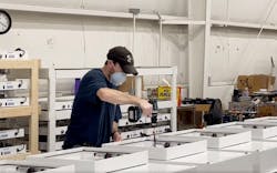 CRI employees reconfiguring stock products for COVID-19 care sites. CRI employees reconfiguring stock products for COVID-19 care sites.