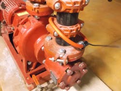 Figure (6): A view of the AstroNova inductive donut sensor used on the HVAC piping (at the HVAC loop pump). This inductive sensor was used to measure the DC voltage waveform on the piping system. Figure (6): A view of the AstroNova inductive donut sensor used on the HVAC piping (at the HVAC loop pump). This inductive sensor was used to measure the DC voltage waveform on the piping system.