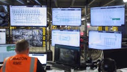 Engineers manage the comings and goings of packages in the fulfillment centers, which are sized at about 800,000 sq. ft. Engineers manage the comings and goings of packages in the fulfillment centers, which are sized at about 800,000 sq. ft.