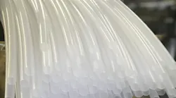 To help set the plastic, the extruded tubing travels immediately through a tank of water that cools the low-density polyethylene (LDPE). The water circulates back through the cooling tower in a closed loop.