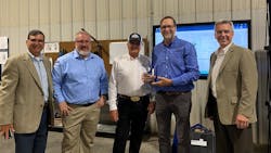 Pro Refrigeration's Jim VanderGiessen, Jim VanderGiessen, Sr., and Damon Reed receive the 2022 EoY Award from Danfoss North America president Rick Sporrer (far right) and regional manager Thomas Savas (far left) at Pro Refrigeration’s Mocksville, NC, facility. Pro Refrigeration's Jim VanderGiessen, Jim VanderGiessen, Sr., and Damon Reed receive the 2022 EoY Award from Danfoss North America president Rick Sporrer (far right) and regional manager Thomas Savas (far left) at Pro Refrigeration’s Mocksville, NC, facility.