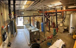 Work included new water source heat pumps, a cooling tower, a high-efficiency boiler, heat exchangers, a two-pipe loop system and new ductwork throughout the building.