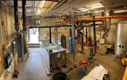 Work included new water source heat pumps, a cooling tower, a high-efficiency boiler, heat exchangers, a two-pipe loop system and new ductwork throughout the building. Work included new water source heat pumps, a cooling tower, a high-efficiency boiler, heat exchangers, a two-pipe loop system and new ductwork throughout the building.