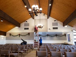 A GLO-1500 open-ended fixture was installed at the rear of the worship area, where UV-C energy blankets the upper air. A GLO-1500 open-ended fixture was installed at the rear of the worship area, where UV-C energy blankets the upper air.