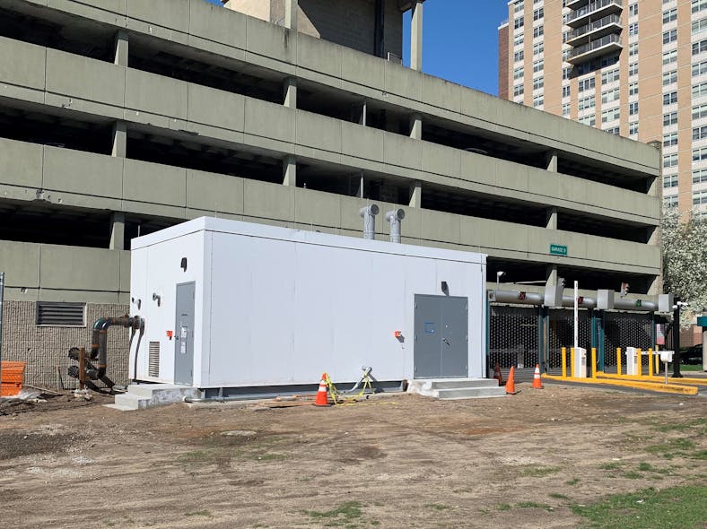 Each of the eight EnviroSep modular plants services a mechanical room in an adjacent parking garage surrounded by a cluster of high-rises.