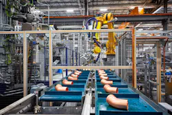 Robotic arm on the assembly line in McPherson, Kansas. Robotic arm on the assembly line in McPherson, Kansas.