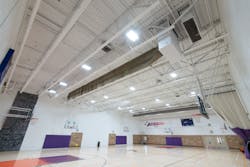 A large gymnasium is heated by hydronic air handlers. A large gymnasium is heated by hydronic air handlers.