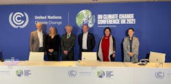 Scoggins (second from left) led ASHRAE&apos;s delegation to COP 26 in Glasgow in 2021.
