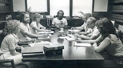 Jimmy Buffett (center) chairs an early meeting of the Save the Manatee Committee.