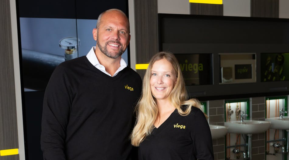 Viega President and CEO Markus Brettschneider (left) welcomes new CFO Sarah Simpson (right).