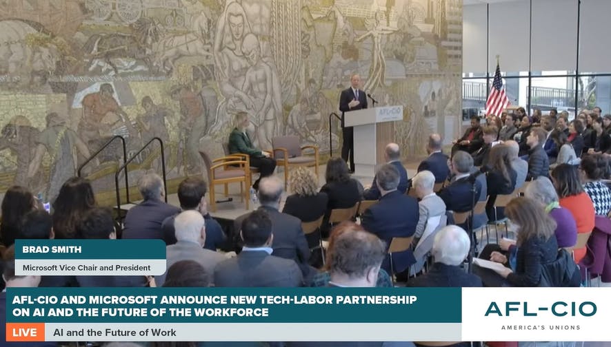Microsoft President Brad Smith addresses an event in Washington, D.C., with AFL-CIO President Liz Shuler on Dec. 11. (Screenshot via webcast.)