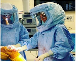 FIGURE 1.0: Orthopedic surgeons in the operating room. FIGURE 1.0: Orthopedic surgeons in the operating room.