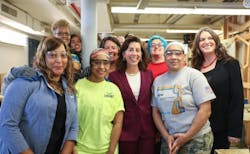 Secretary Raimondo surrounded by women in the trades. Secretary Raimondo surrounded by women in the trades.