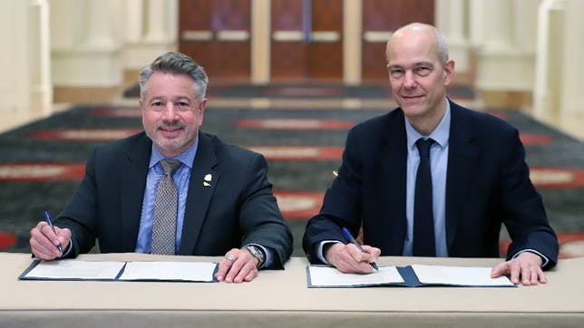 ASHRAE President Bill McQuade and UNEP&rsquo;s OzonAction Head Jim Curlin signed the two-year work plan at ASHRAE's Winter Conference in Las Vegas this month.