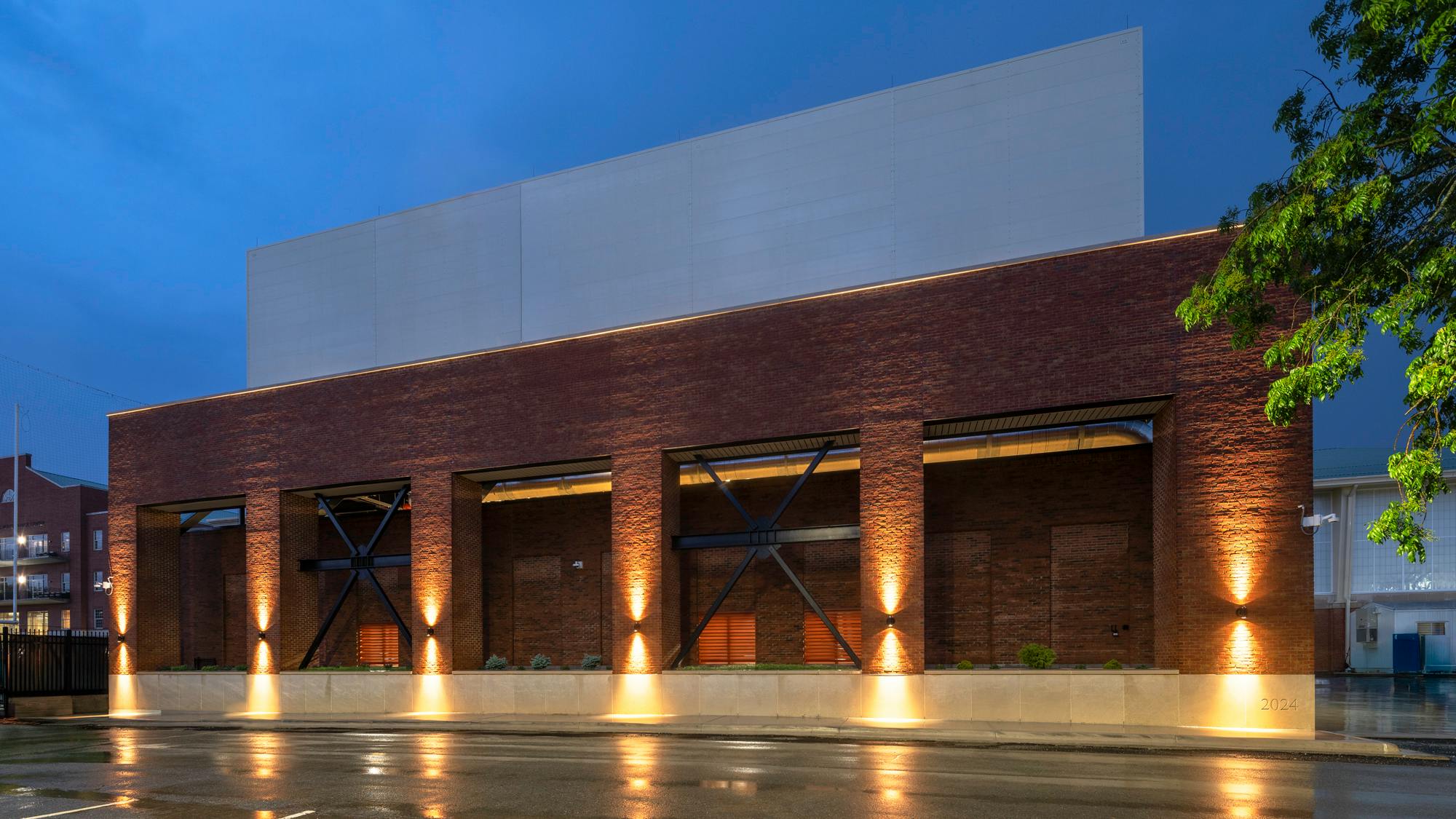 The custom towers sit on top of the new superstructure spanning over the existing plant, which is sheathed in brick to blend with nearby buildings.